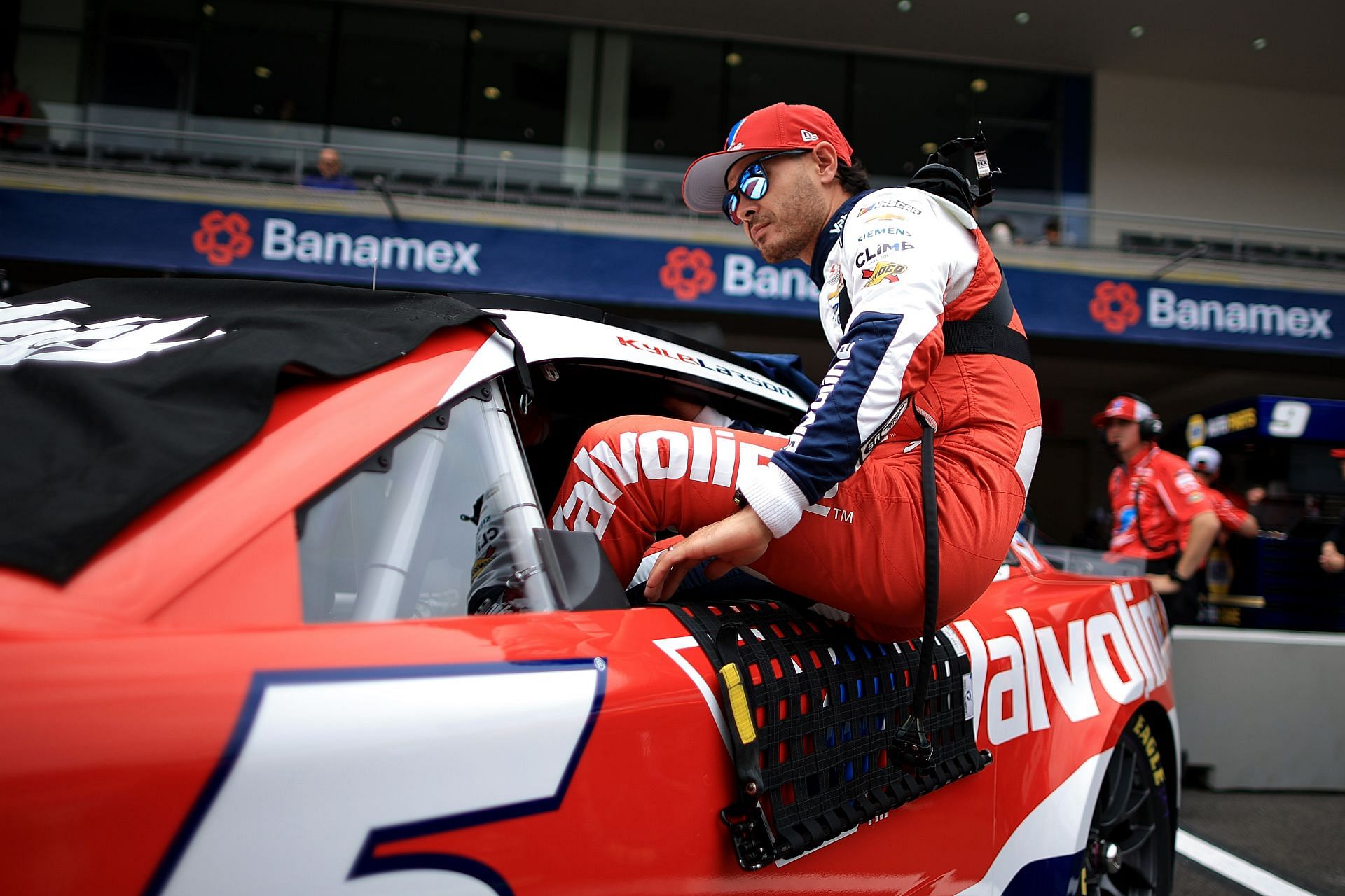 Kyle Larson enters his car for the NASCAR Cup Series Viva Mexico 250 qualifying at Autodromo Hermanos Rodriguez. Source: Getty